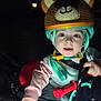 Tinatin joined the competition — help win amazing prizes! child, toddler, helmet, bike, bicycle, night, headlight, hand, red, green_light, cute, outdoor, clothing, safety, helmet_strap, face, expression, toy, activity, exploration
