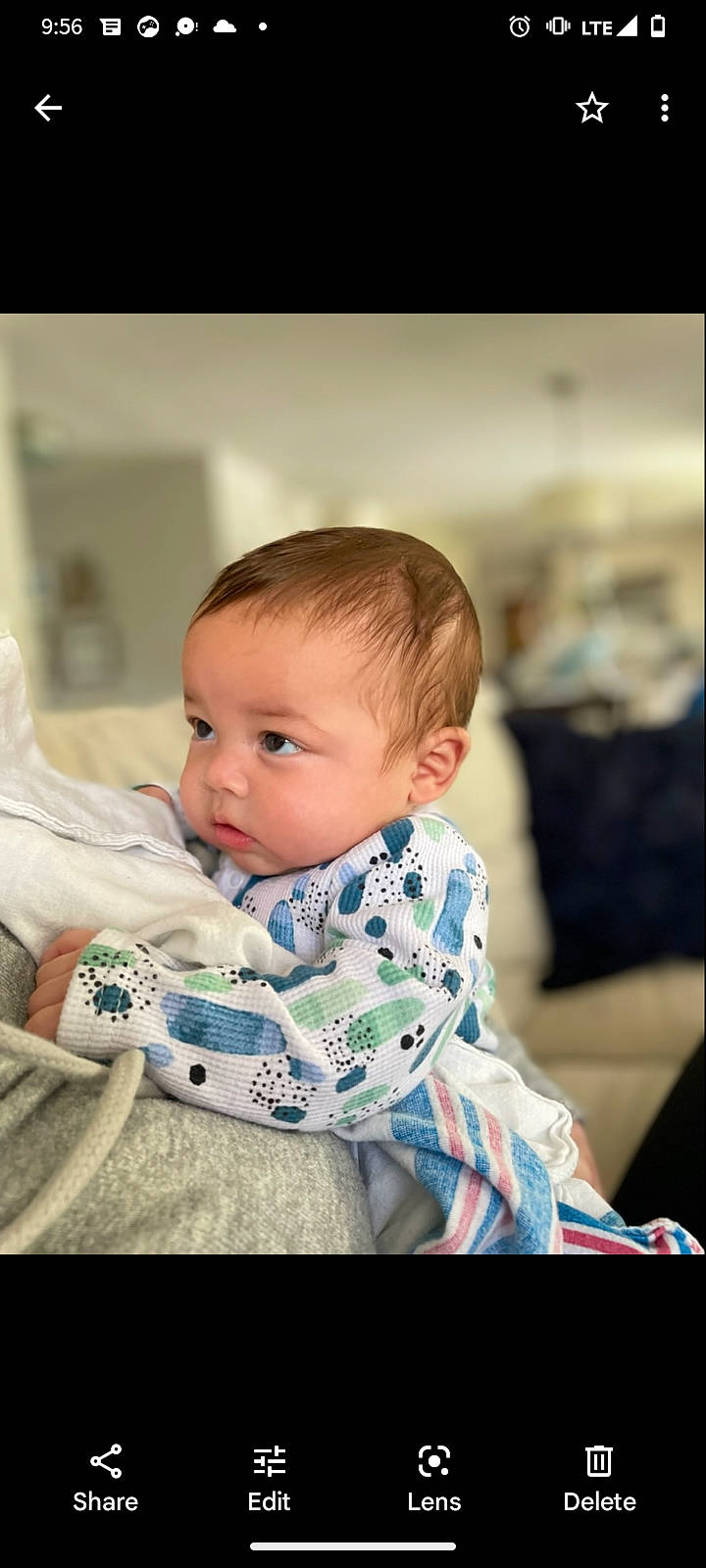 Cassius is registered to the contest to win money with this photo: baby, baby_toddler_clothing, blond, cheek, child, collar, comfort, flash_photography, fun, grass, happy, iris, pattern, person, portrait_photography, room, sitting, sleeve, toddler