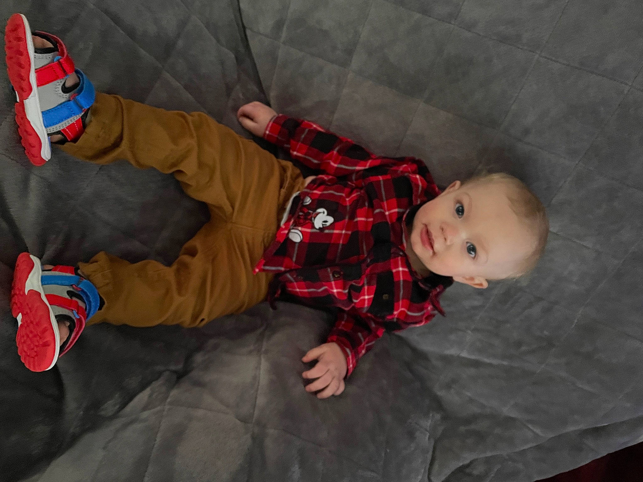 Jaisean joined the competition — help win amazing prizes! baby, baby_toddler_clothing, carmine, child, comfort, floor, flooring, fun, human_body, linens, mammal, pattern, person, plaid, room, sitting, sock, textile, toddler, toy