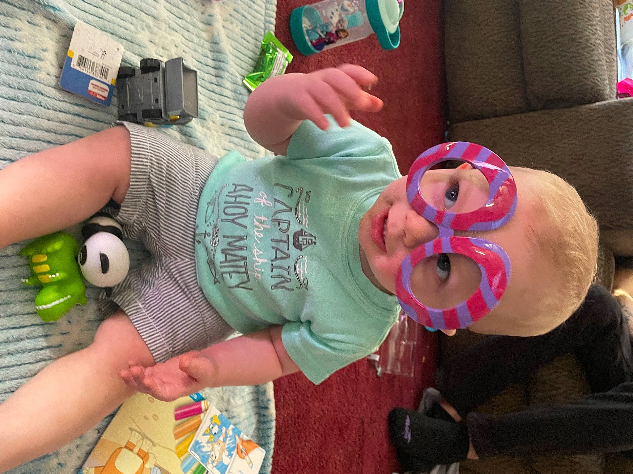 Jaisean joined the competition — help win amazing prizes! arm, baby, baby_toddler_clothing, child, cool, eyewear, finger, fun, glasses, hat, joint, leisure, mouth, nail, person, pink, thigh, thumb, toddler, toy