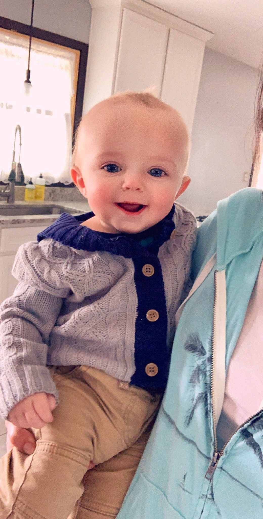 Jace is registered to the contest to win money with this photo: baby, baby_products, cheek, child, face, head, joy, outerwear, person, product, skin, toddler