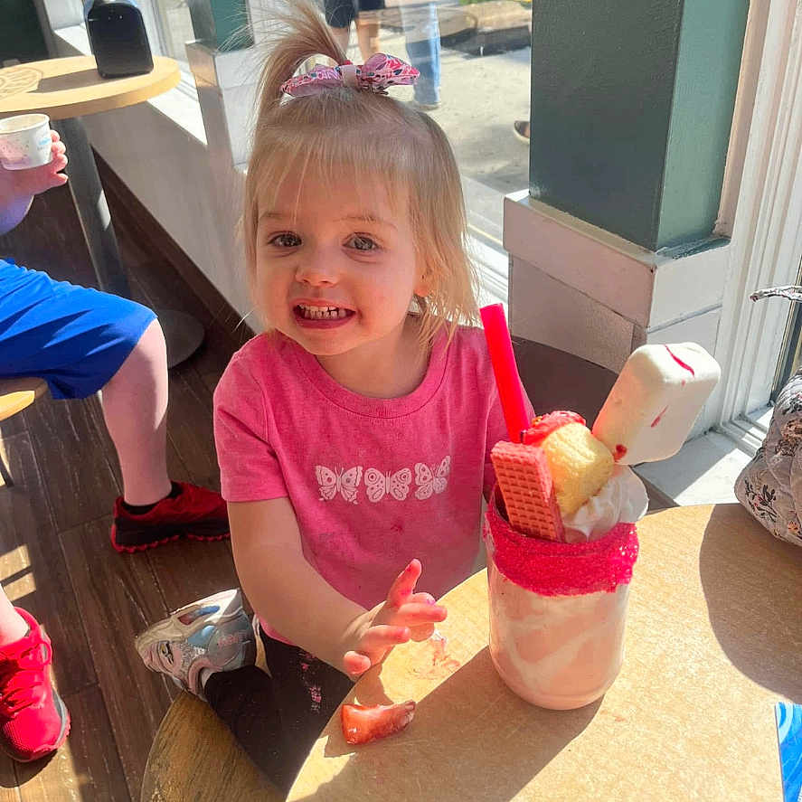 Olivia joined the competition — help win amazing prizes! child, clothing, cream, cutlery, dessert, face, female, food, footwear, girl, head, icecream, icing, lunch, meal, person, photography, portrait, shoe, spoon