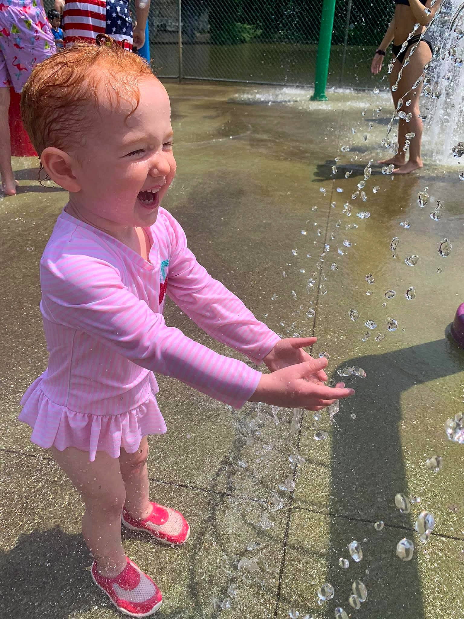 Sydney joined the competition — help win amazing prizes! adaptation, child, fountain, fun, leisure, liquid_bubble, person, pink, play, puddle, recreation, smile, summer, toddler, vacation, water, water_feature