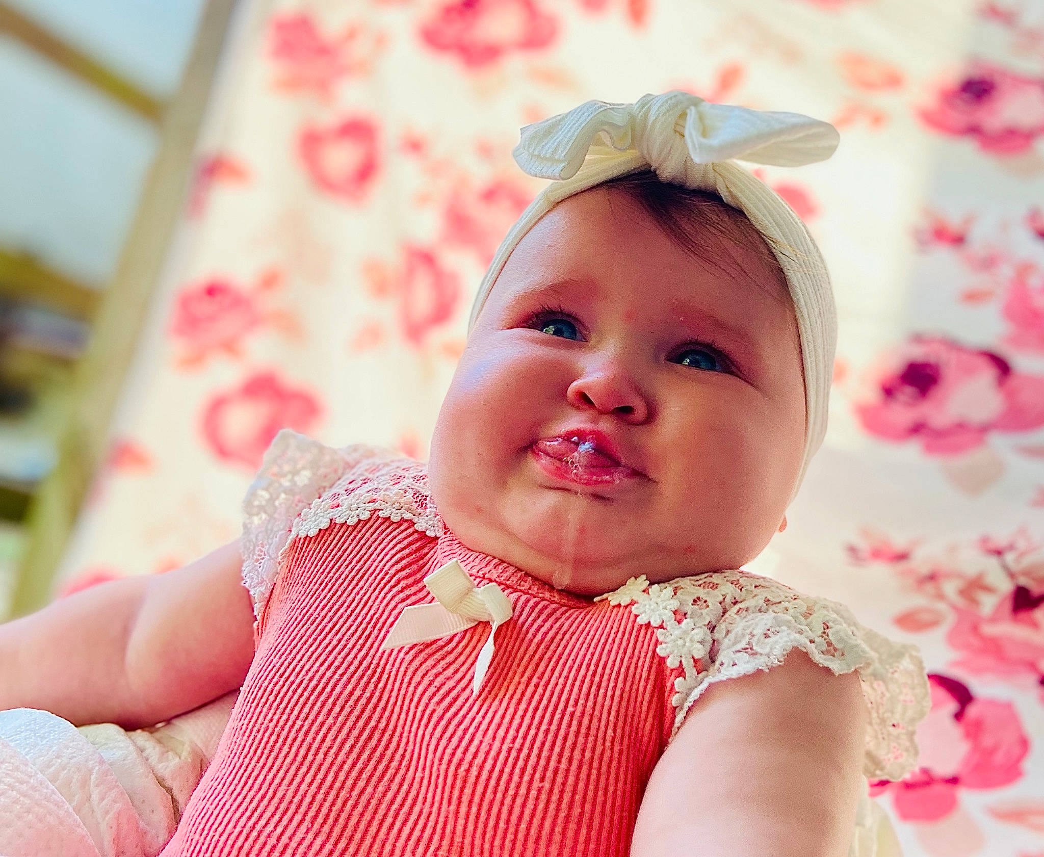 Ella Mae joined the competition — help win amazing prizes! baby, baby_toddler_clothing, cheek, child, collar, eyelash, fashion_accessory, hair_accessory, hairstyle, happy, headband, headgear, headpiece, headwear, lip, pattern, person, pink, skin, sleeve