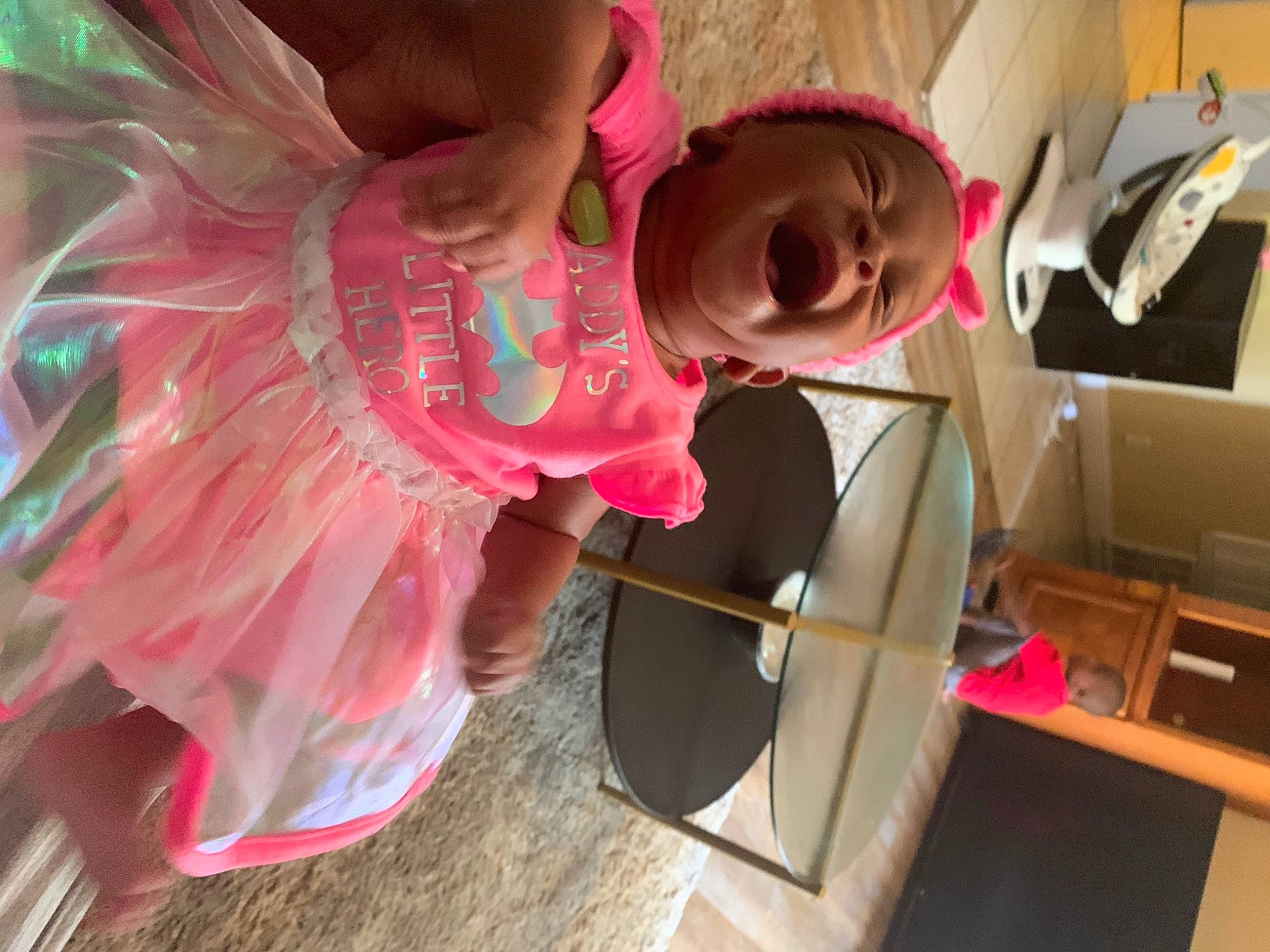 Kamille is registered to the contest to win money with this photo: ballet_tutu, costume, fashion_accessory, headgear, person, pink, room, toddler