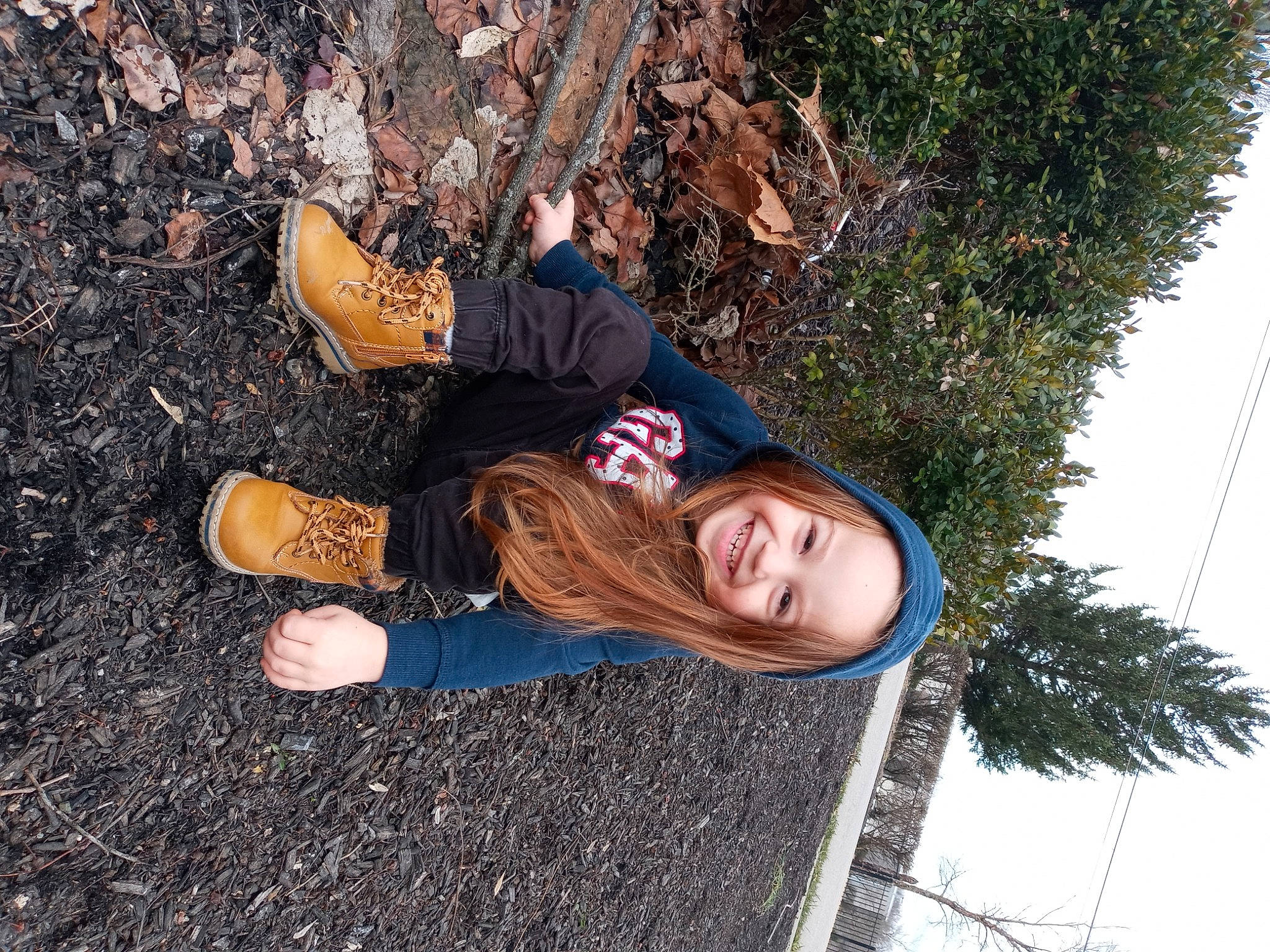 Jared is registered to the contest to win money with this photo: boot, branch, fun, grass, happy, hat, headwear, human_leg, joy, leg, leisure, people_in_nature, person, plant, sky, smile, soil, street_fashion, thigh, tree