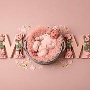 Melanie joined the competition — help win amazing prizes! baby, basket, pink, flower, letters, m, mom, headband, infant, soft_texture, decor, petals, cute, child, portrait, lying_down, cozy, celebration, floral_arrangement, studio_photo