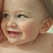 Luca joined the competition — help win amazing prizes! baby, smiling, portrait, child, face, skin, hair, happy, expression, cute, infant, closeup, person, indoors, young, cheerful, natural_light, bare_shoulders, head, looking_away
