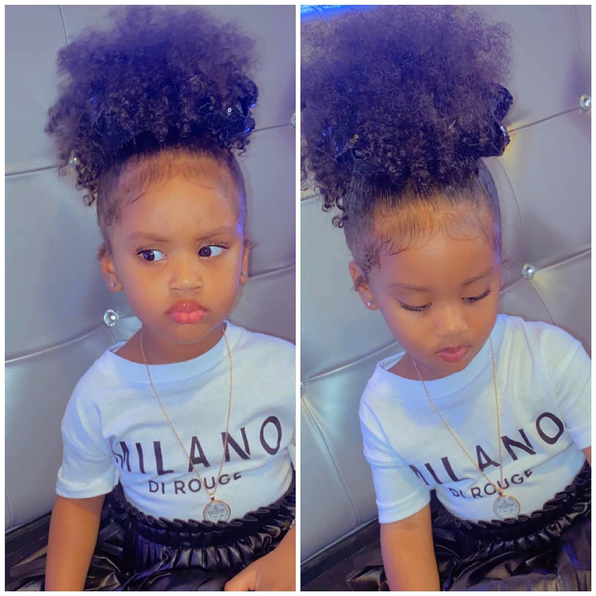 Jaliyah is registered to the contest to win money with this photo: black, black_hair, blue, chin, eye, eyebrow, eyelash, face, fashion, forehead, hair, hairstyle, human, neck, person, photograph, product, purple, sleeve, t_shirt