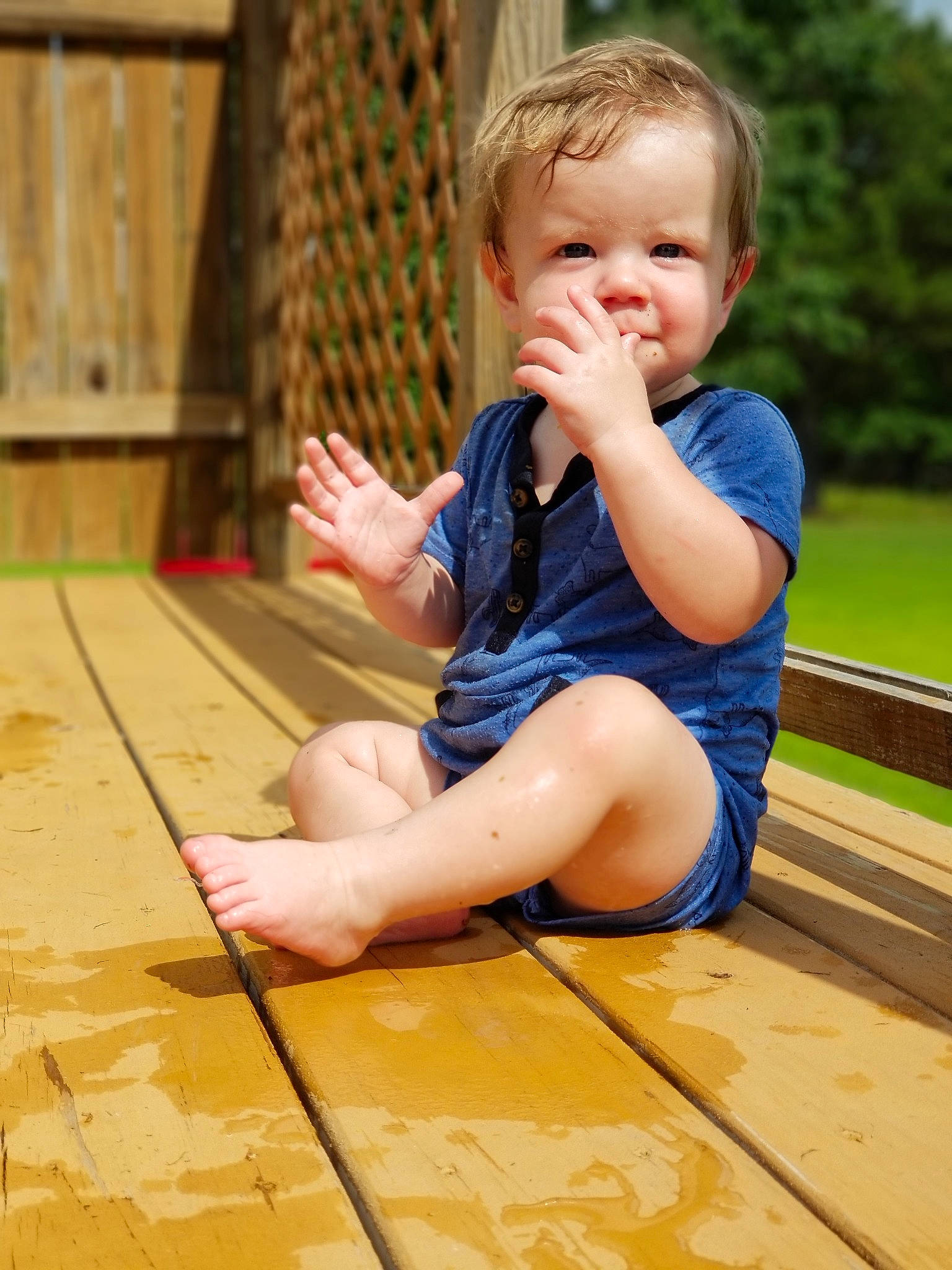 Jayse is registered to the contest to win money with this photo: child, finger, floor, flooring, leg, leisure, person, play, sitting, toddler, wood