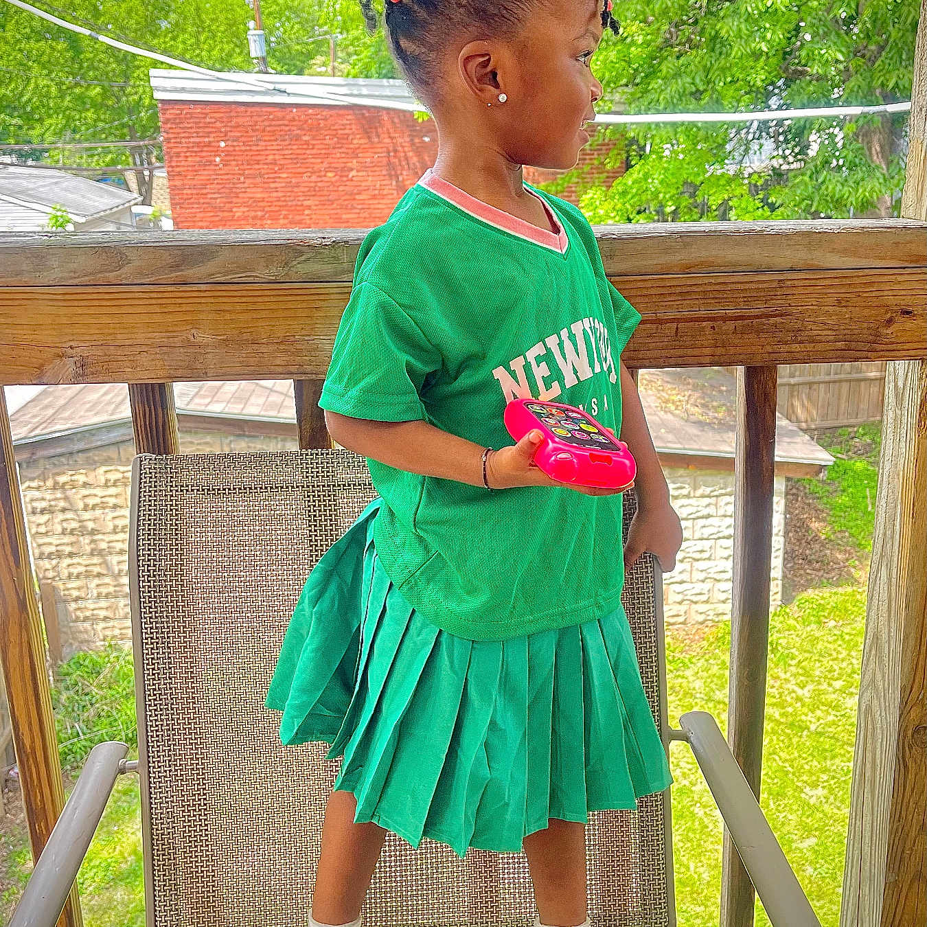 Hasina is registered to the contest to win money with this photo: architecture, backyard, building, child, clothing, dress, face, female, girl, head, house, housing, nature, outdoors, person, photography, porch, portrait, skirt, sleeve