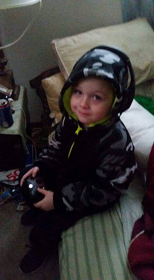 Matthew is registered to the contest to win money with this photo: baby, child, cool, head, headgear, headwear, helmet, motorcycle_helmet, person, personal_protective_equipment, selfie, smile, toddler