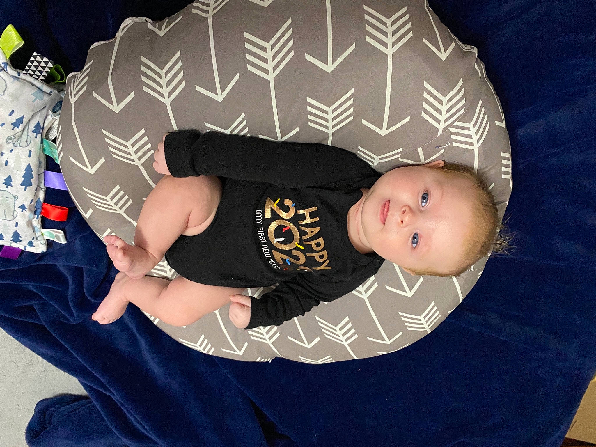 Blaise is registered to the contest to win money with this photo: automotive_wheel_system, baby, baby_products, baby_toddler_clothing, child, comfort, cool, elbow, electric_blue, fashion_accessory, flash_photography, font, fun, hat, pattern, person, sitting, sleeve, t_shirt, textile
