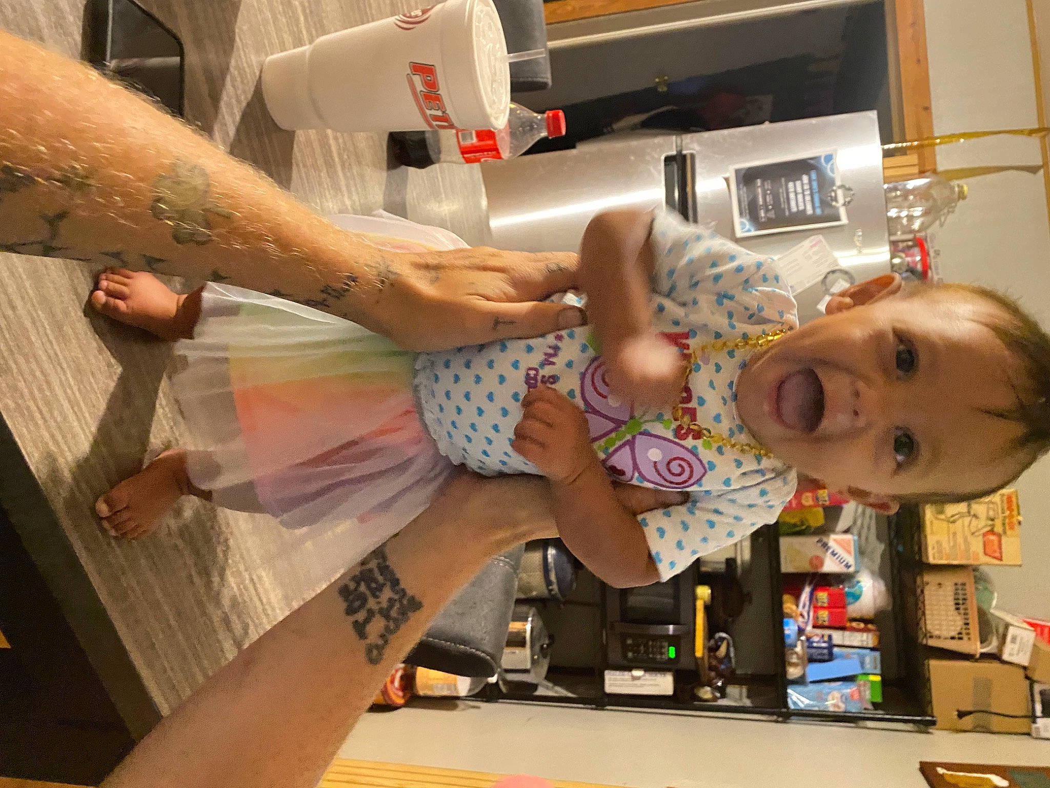 River joined the competition — help win amazing prizes! bookcase, cabinetry, cooking, fashion_design, flesh, fun, homemaker, human_leg, kitchen, kitchen_appliance, machine, microwave_oven, person, refrigerator, room, service, tableware, toddler, visual_arts, wood