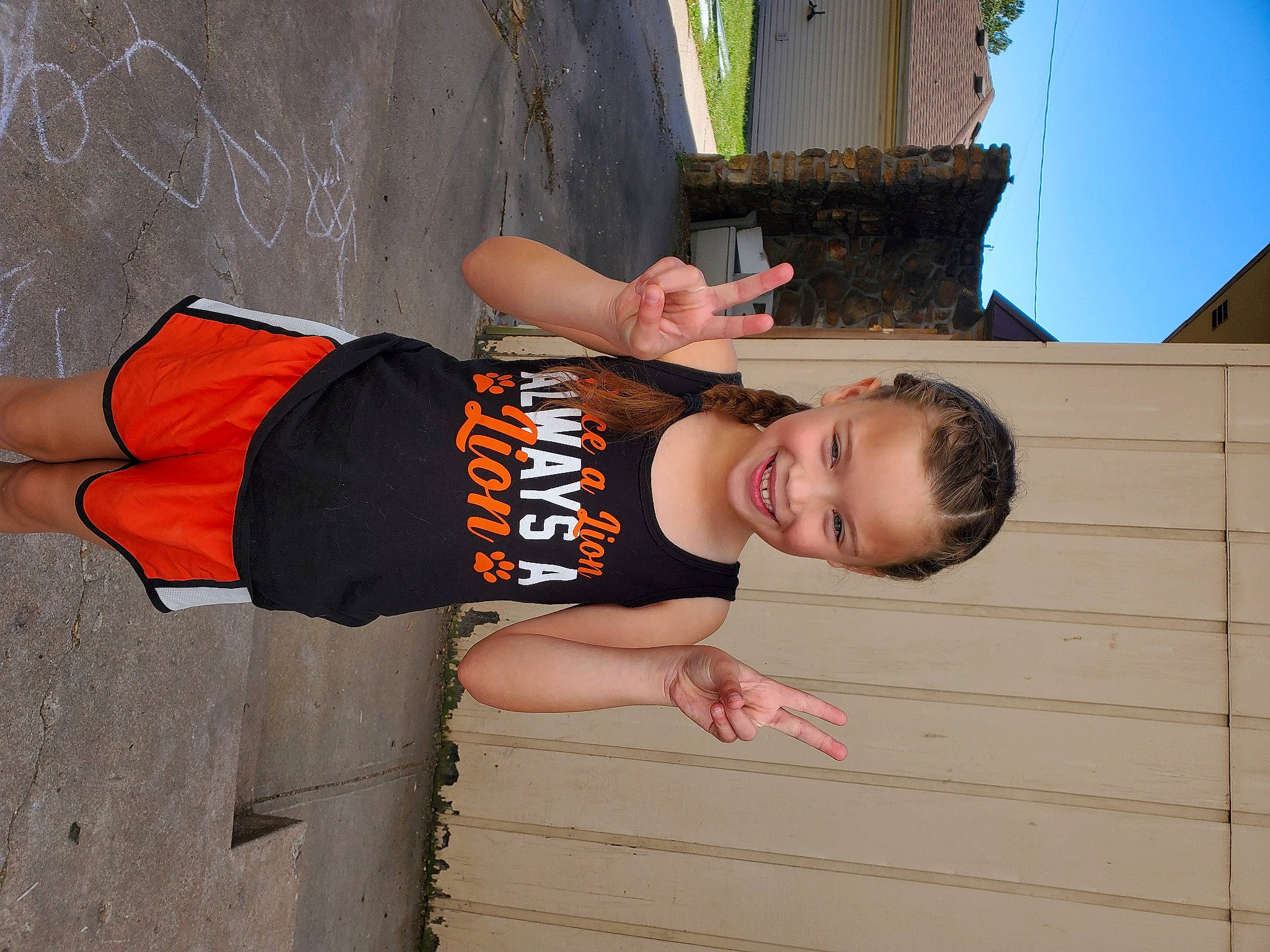 Judith is registered to the contest to win money with this photo: child, elbow, flash_photography, fun, happy, human_leg, joy, leisure, pattern, person, sitting, sky, sleeve, t_shirt, thigh, toddler, tree, waist, wood, wrist