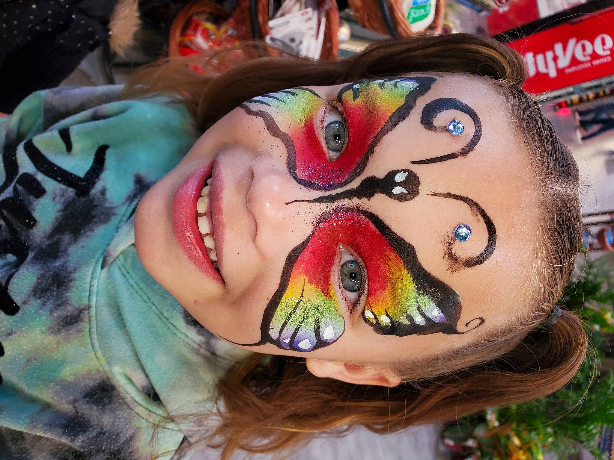 Judith is registered to the contest to win money with this photo: art, close_up, cool, event, eyelash, eyewear, feather, fictional_character, fun, headgear, human_body, illustration, jaw, mask, mouth, organism, painting, person, personal_protective_equipment, smile