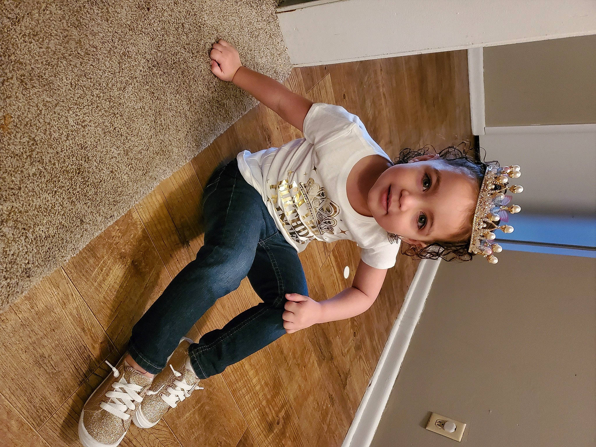 Juliet joined the competition — help win amazing prizes! child, elbow, flash_photography, flooring, fun, happy, hardwood, hat, house, human_leg, joy, knee, leisure, person, sitting, smile, sneakers, t_shirt, thigh, toddler