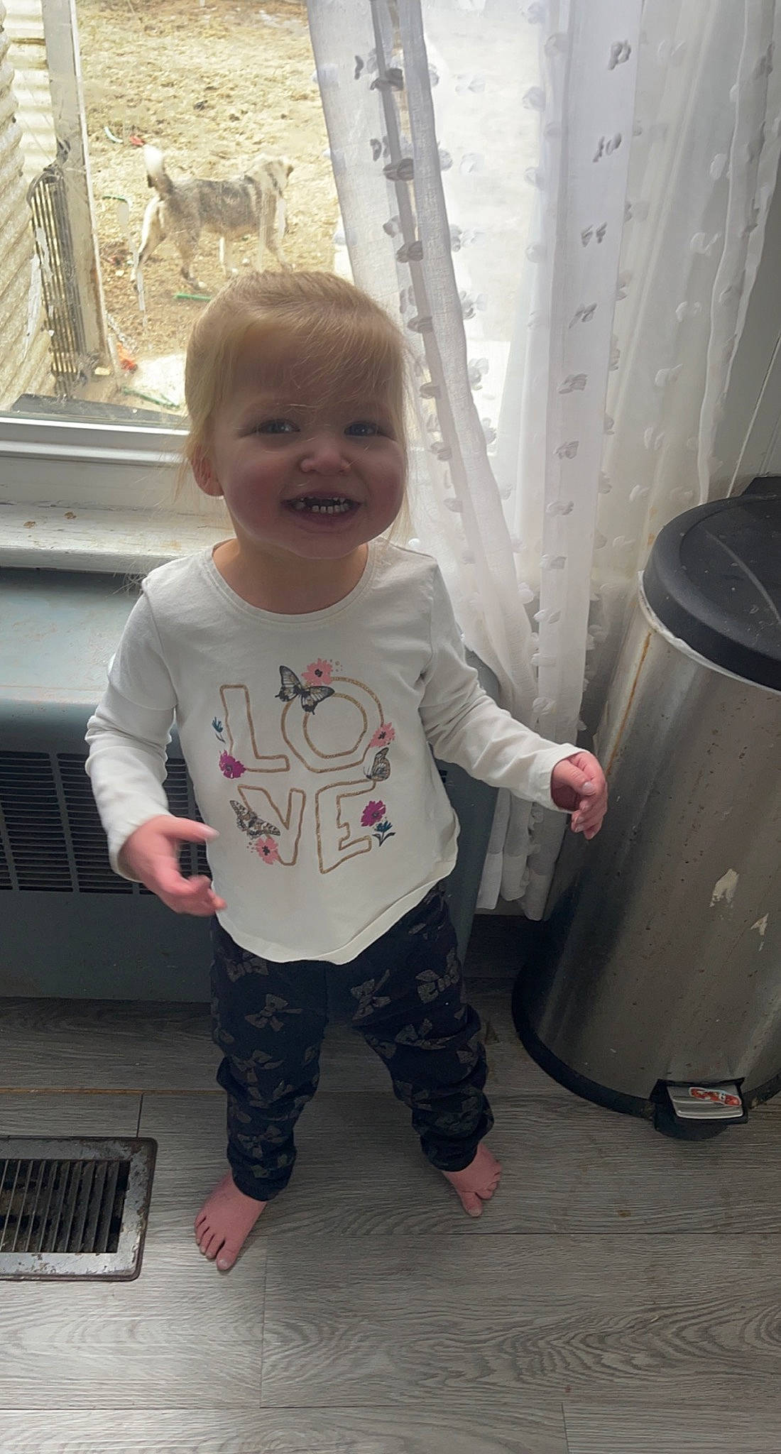 Kennedy joined the competition — help win amazing prizes! baby, baby_toddler_clothing, child, cool, face, flooring, fun, gas, gesture, happy, head, person, product, skin, sleeve, smile, standing, t_shirt, toddler, waste_container
