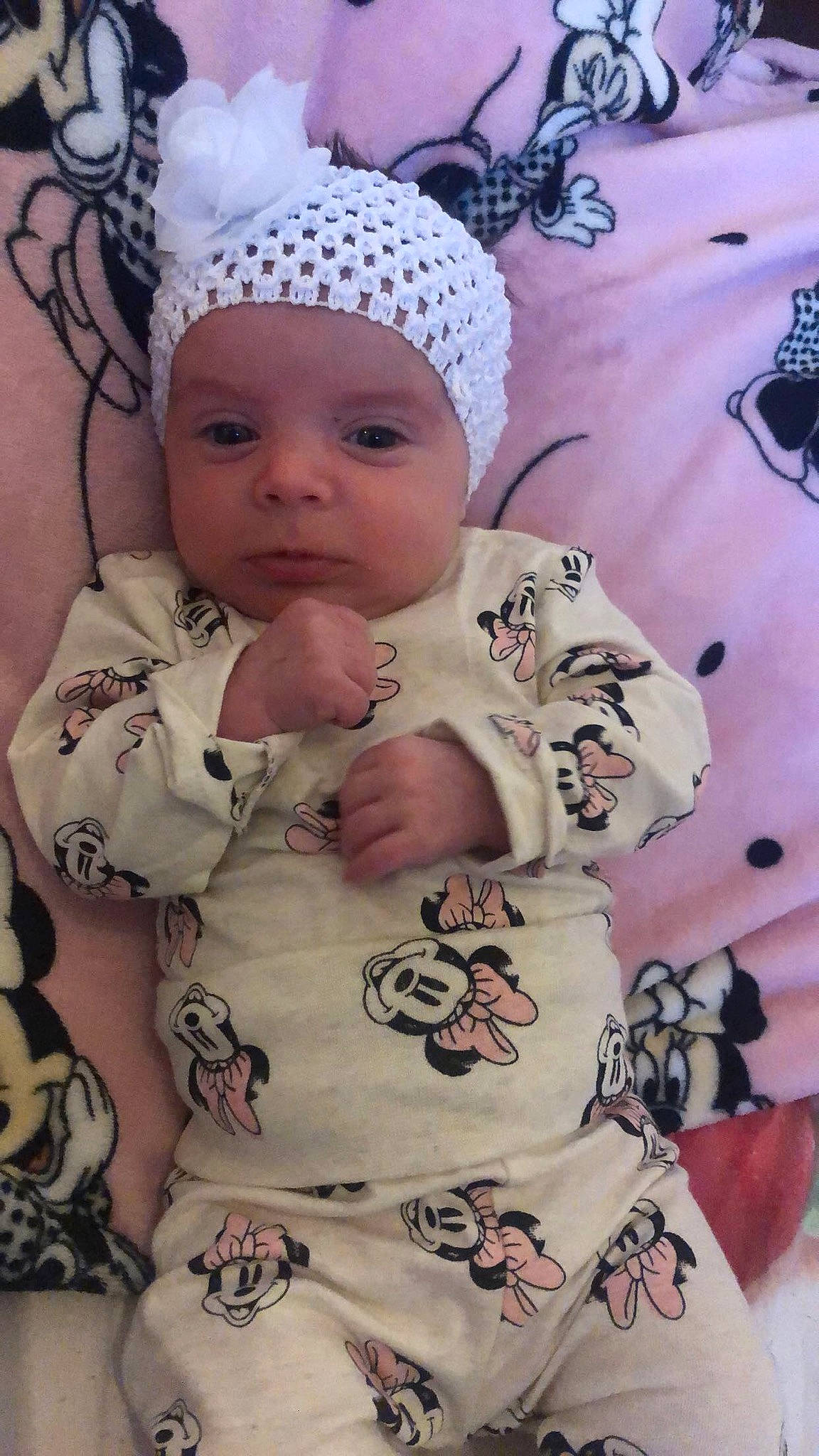 Inaya participe au concours pour gagner de l'argent avec cette photo : baby, baby_products, baby_sleeping, baby_toddler_clothing, cap, cheek, child, eye, happy, head, headgear, headwear, knit_cap, linens, outerwear, pattern, person, pink, skin, sleeve