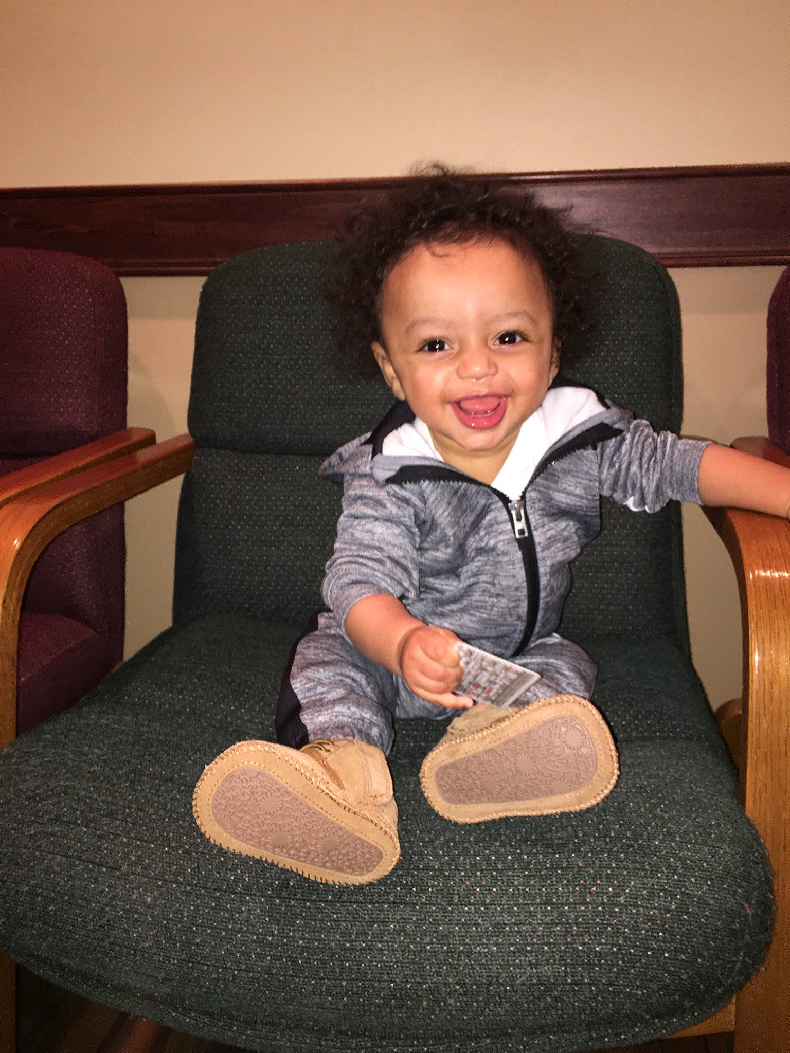 Braxton joined the competition — help win amazing prizes! chair, child, comfort, finger, furniture, joy, lap, leg, person, shoe, sitting, toddler