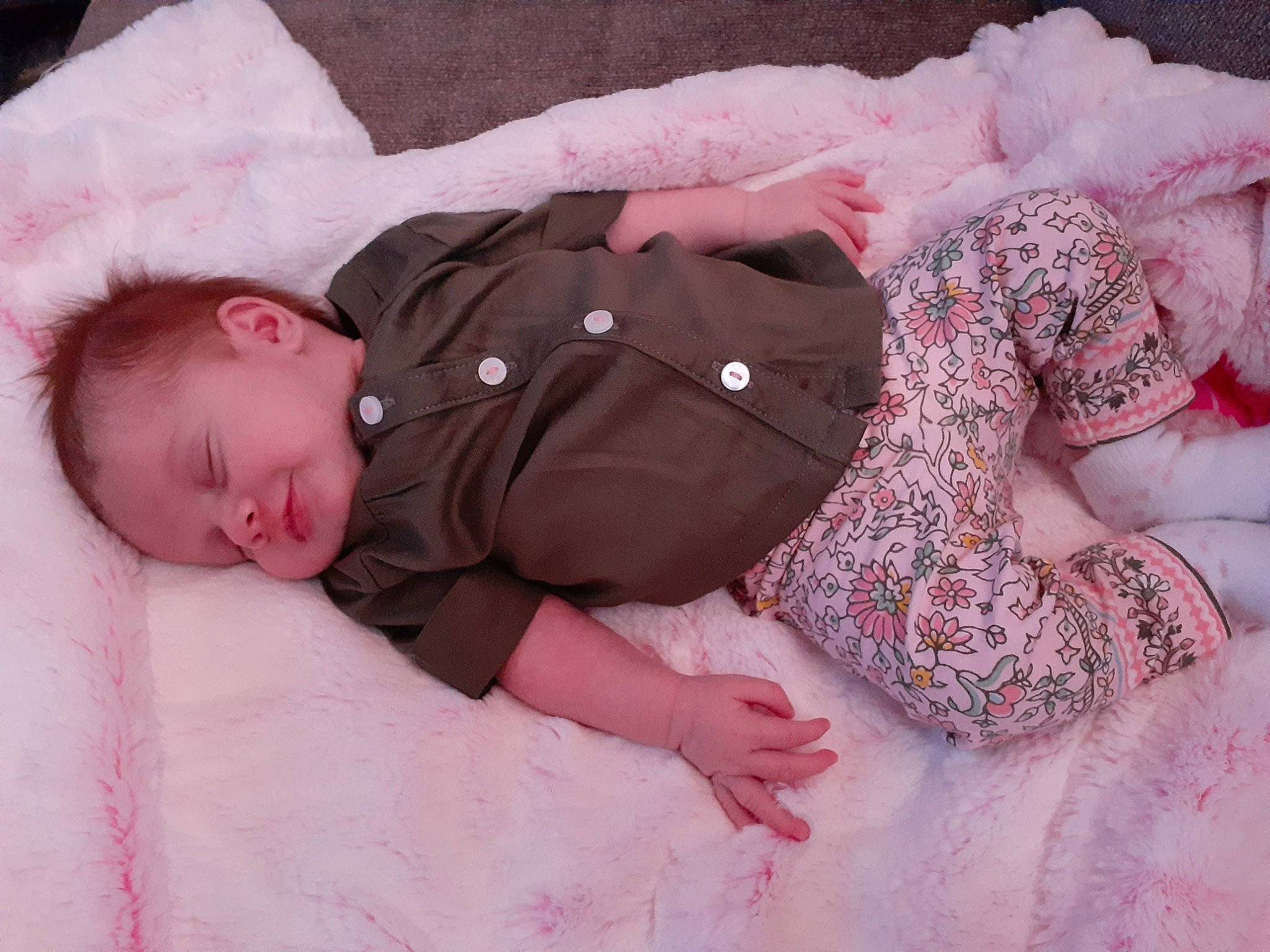 Maisyn is registered to the contest to win money with this photo: baby, baby_sleeping, bedding, bedtime, child, fur, linens, person, pink, product, skin, sleep, textile, toddler