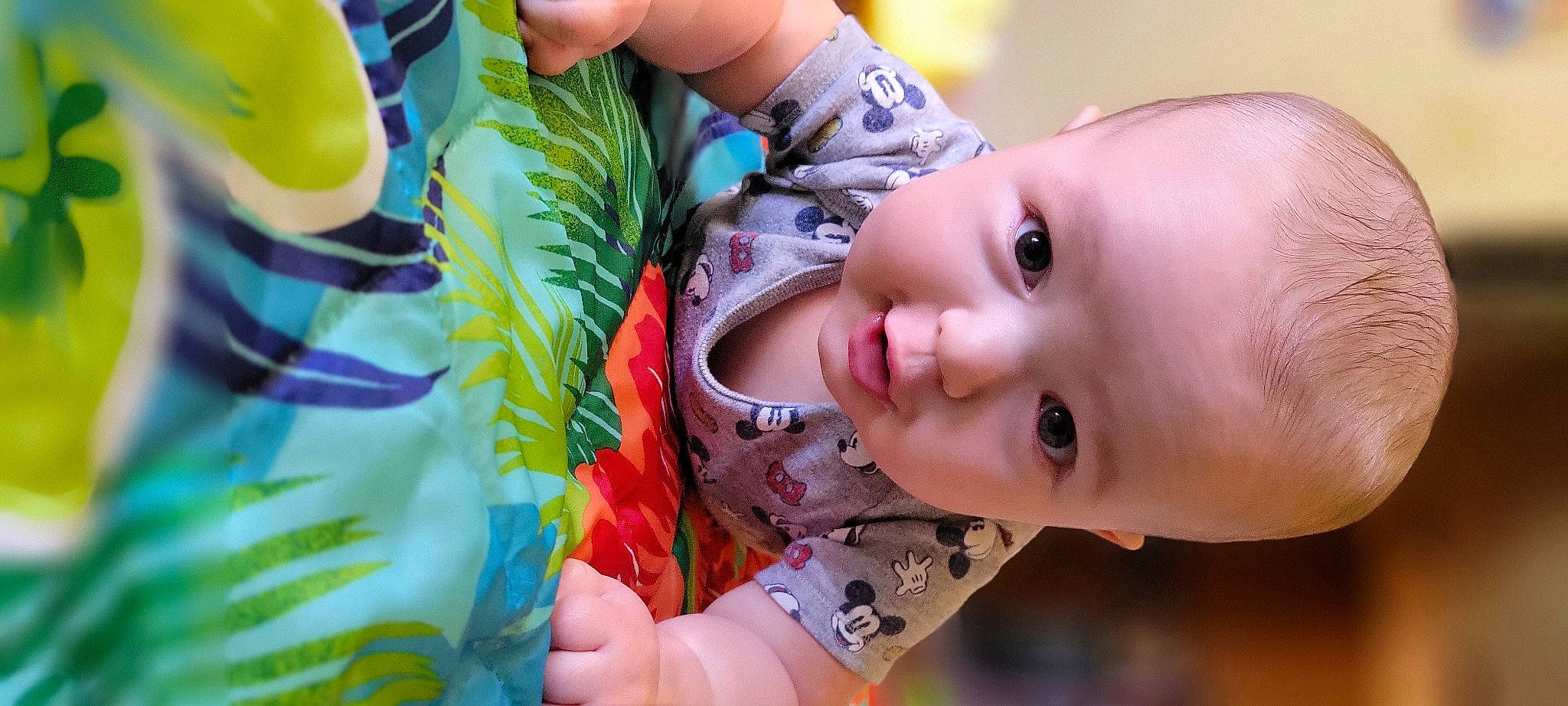 Gregory is registered to the contest to win money with this photo: baby_toddler_clothing, cheek, dress, eyelash, face, finger, fun, gesture, grass, hand, happy, iris, leaf, lip, nose, person, pink, plant, product, skin