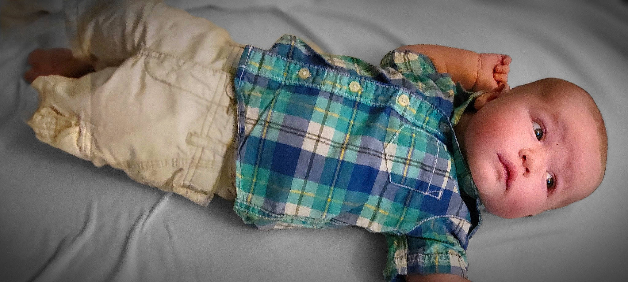 Gregory joined the competition — help win amazing prizes! baby, baby_toddler_clothing, child, comfort, elbow, electric_blue, finger, linens, pattern, person, plaid, red, skin, sleeve, tartan, textile, thumb, tints_and_shades, toddler