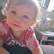 Jurnie joined the competition — help win amazing prizes! child, toddler, baby, portrait, face, eyes, looking_at_camera, curious, serious_expression, pink_shirt, short_hair, indoor, home, window, sunlight, chair, table, papers, close_up, person