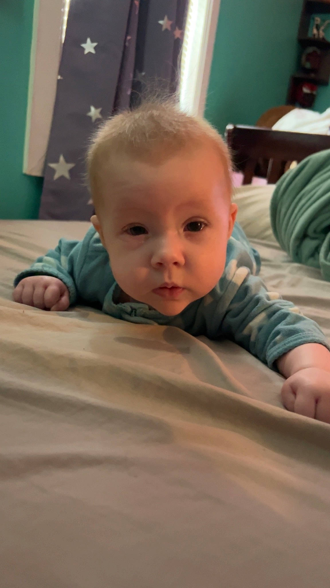 Kalliope is registered to the contest to win money with this photo: baby, baby_toddler_clothing, cheek, chin, comfort, crawling, facial_expression, finger, floor, flooring, fun, hardwood, iris, mouth, nose, person, skin, sleeve, t_shirt, toddler