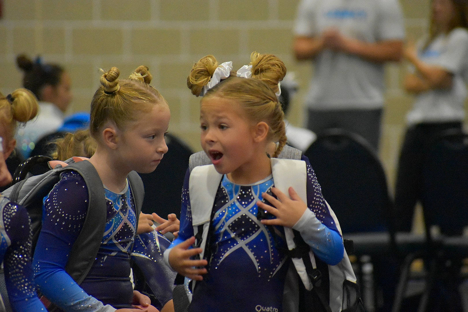 Kayleigh is registered to the contest to win money with this photo: chair, championship, competition_event, crowd, electric_blue, event, fun, happy, leisure, luggage_and_bags, person, player, recreation, sports, sports_uniform, surprise, t_shirt, team, team_sport, toddler