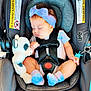 baby, car_seat, sleeping, headband, plush_toy, panda, toy, straps, infant, child, cute, clothing, socks, safety, seat, resting, indoor, comfort, peaceful, small