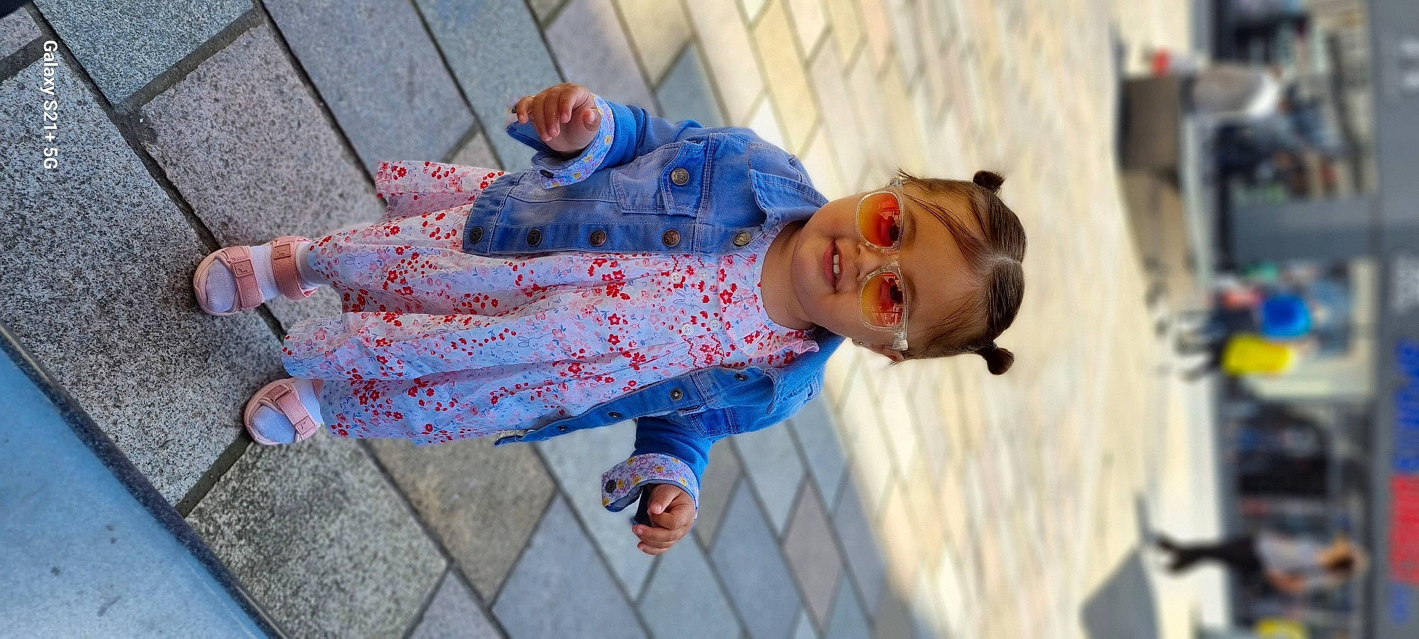 Yaran Ahmed joined the competition — help win amazing prizes! child, denim, electric_blue, eyewear, flooring, foot, human_leg, leisure, pattern, person, plaid, portrait_photography, sandal, sitting, sleeve, toddler, waist, wood