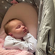 Freya Rose is registered to the contest to win money with this photo: baby, sleeping, blanket, pink, bassinet, gray, stars, cozy, infant, cute, soft, peaceful, child, newborn, resting, warm, clothing, indoors, face, portrait