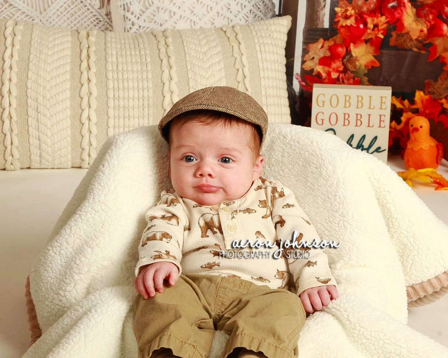 Grayson joined the competition — help win amazing prizes! baby, baby_toddler_clothing, bedding, cheek, child, comfort, couch, eye, fashion_accessory, fur, happy, linens, pattern, peach, person, portrait_photography, room, sitting, sleeve, throw_pillow