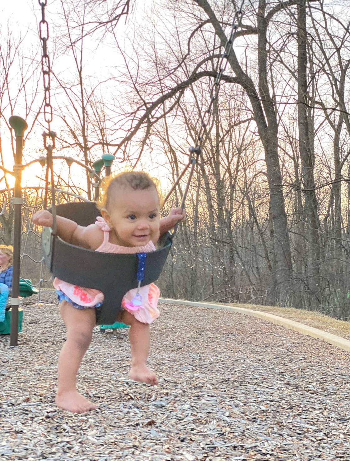 Amaia is registered to the contest to win money with this photo: baby, baby_toddler_clothing, blurred, child, city, electric_blue, fun, grass, happy, leaf, leisure, people_in_nature, person, plant, recreation, sitting, sky, smile, soil, toddler
