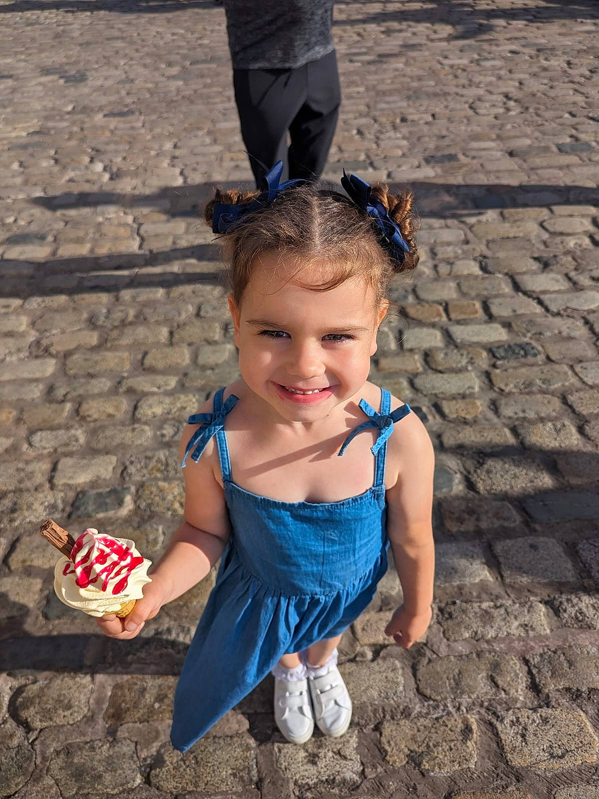 Esme is registered to the contest to win money with this photo: baby_toddler_clothing, beauty, child, electric_blue, flooring, fun, grass, happy, human_leg, joy, leg, leisure, people_in_nature, person, play, recreation, sand, sitting, smile, soil