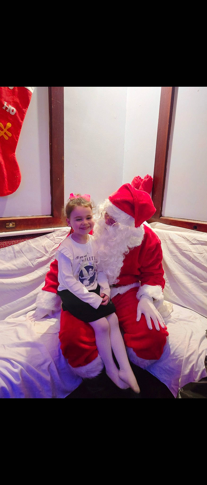 Esme joined the competition — help win amazing prizes! carmine, child, christmas, christmas_eve, costume, event, fictional_character, fun, fur, happy, hat, holiday, joy, lap, magenta, person, pink, red, santa_claus, smile