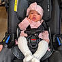 Zhamira joined the competition — help win amazing prizes! baby, infant, car_seat, pink, knitwear, headband, white_tights, socks, child, cute, indoor, seatbelt, safety, person, apparel, expression, hand_gesture, closeup, face, adorable