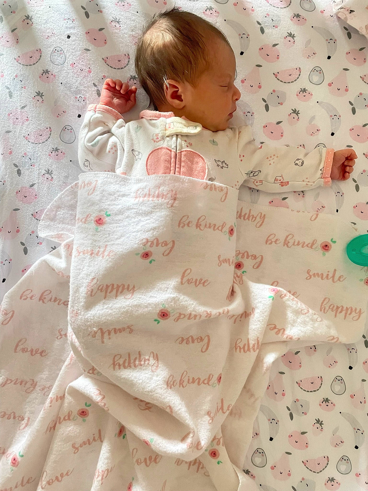 Catalina is registered to the contest to win money with this photo: arm, baby, baby_products, baby_safety, baby_sleeping, baby_toddler_clothing, bed, bedding, bedroom, child, comfort, linens, pattern, person, pink, skin, sleeve, t_shirt, textile, toddler