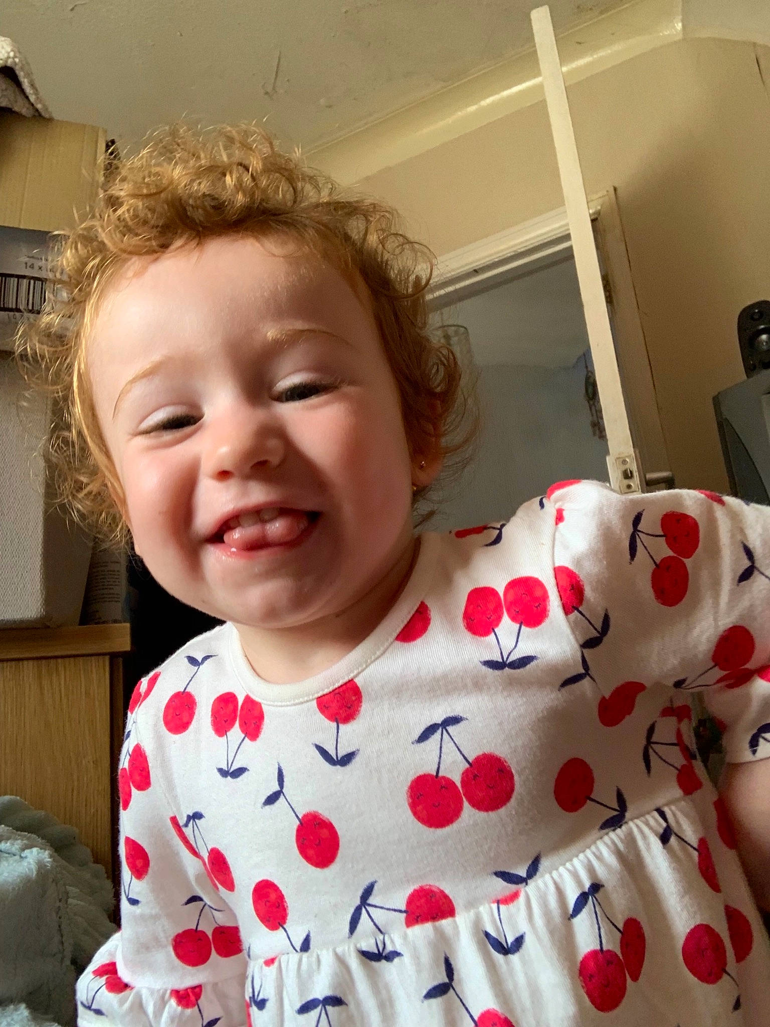 Theadora is registered to the contest to win money with this photo: baby, cheek, child, face, head, joy, lip, nose, person, skin, smile, toddler