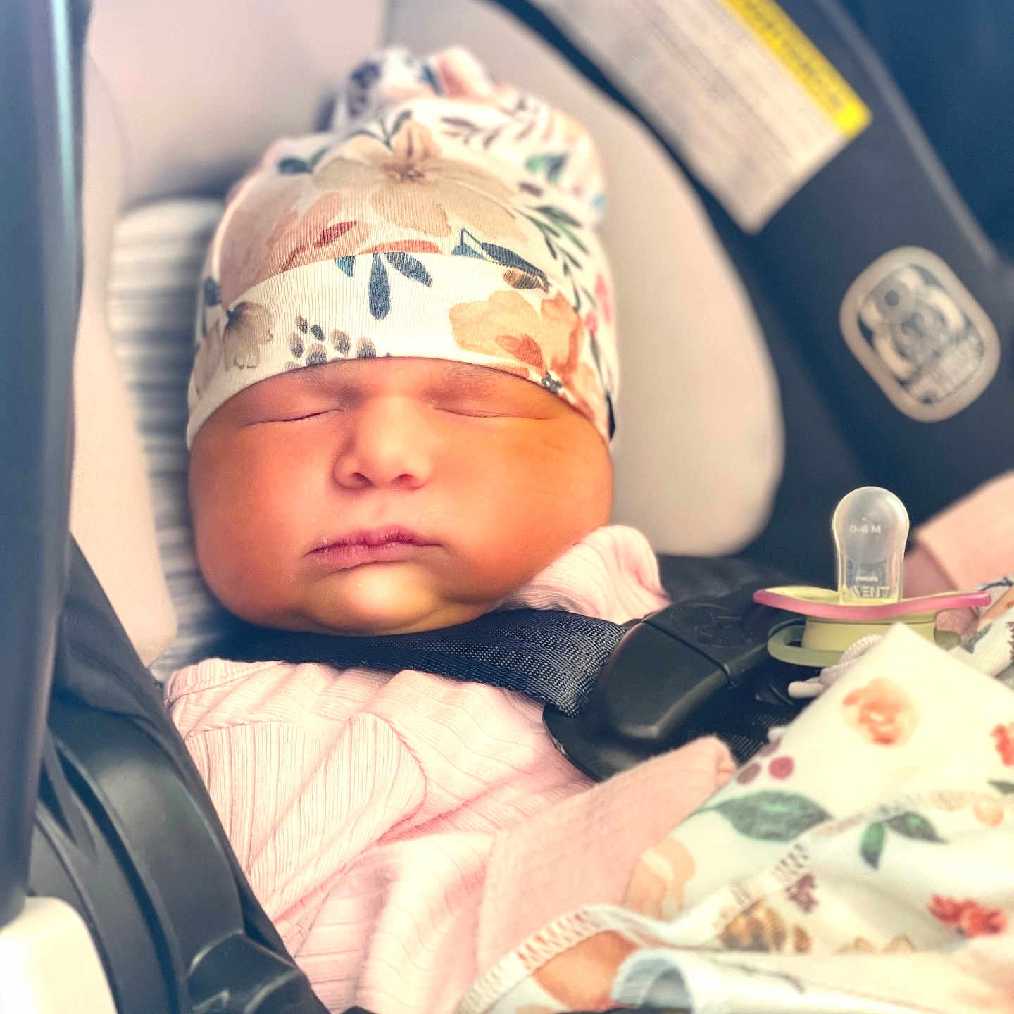 Lilith is registered to the contest to win money with this photo: accessories, baby, bonnet, cap, car, car_interior, clothing, cushion, face, glove, hat, head, homedecor, newborn, person, photography, portrait, sleeping, transportation, vehicle