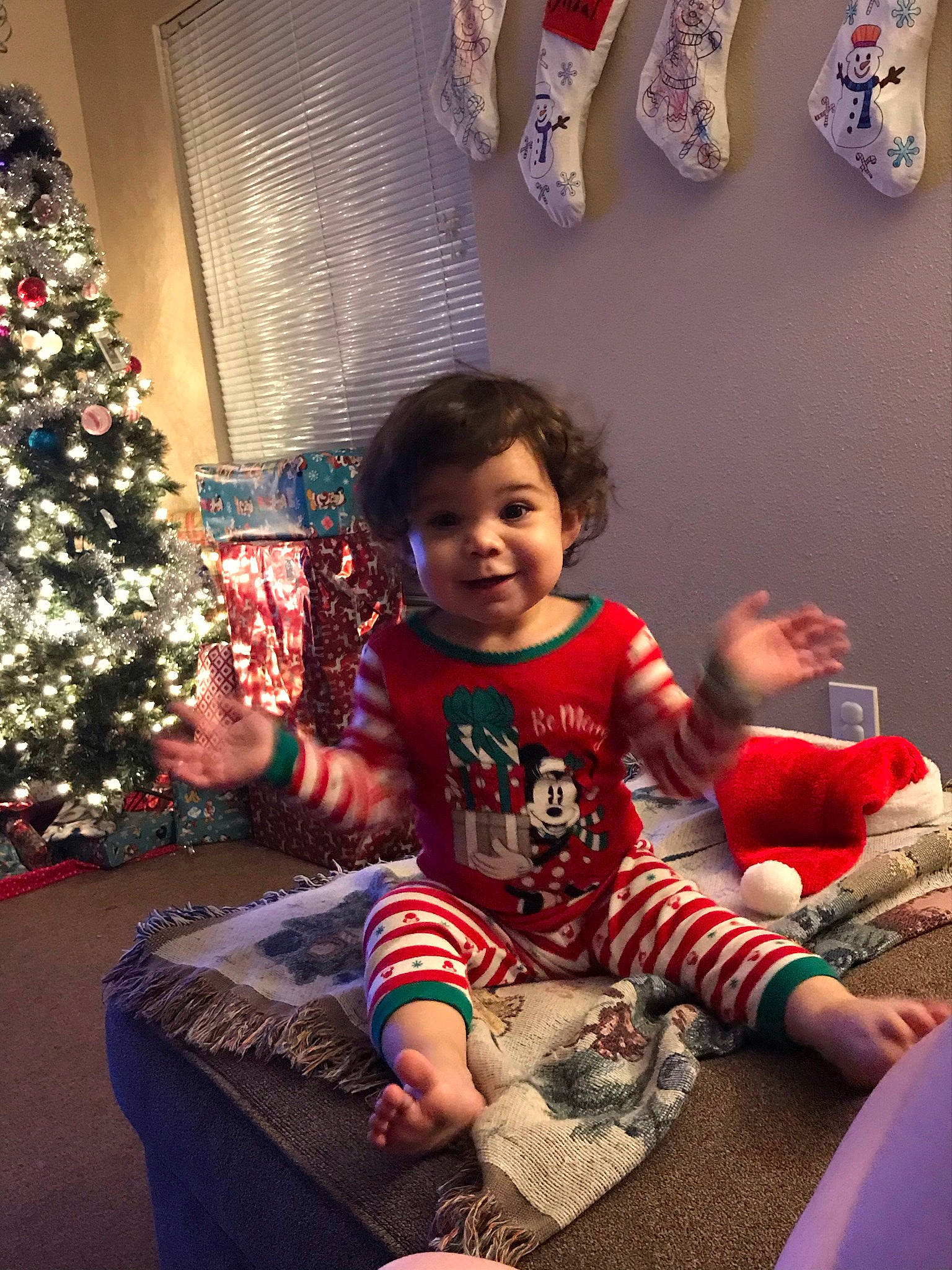 Meilani joined the competition — help win amazing prizes! baby, baby_toddler_clothing, carmine, child, christmas, christmas_decoration, christmas_eve, christmas_lights, christmas_ornament, christmas_tree, holiday, holiday_ornament, interior_design, joy, lap, living_room, ornament, person, play, room
