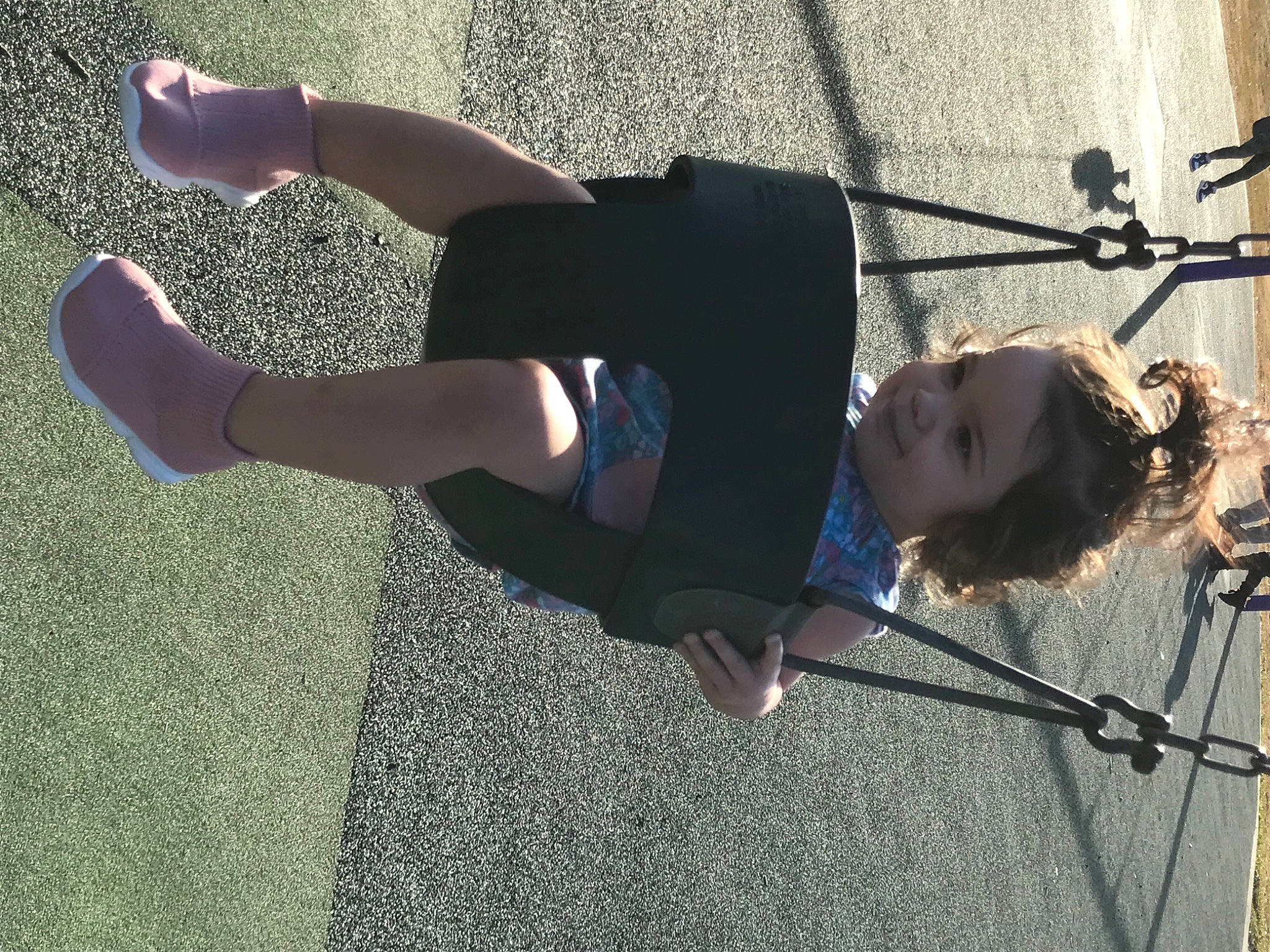 Meilani joined the competition — help win amazing prizes! ankle, baby, baby_toddler_clothing, calf, day_dress, foot, human_leg, joint, knee, outdoor_play_equipment, person, sandal, shadow, shoe, sock, swing, toddler