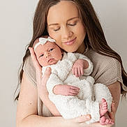 Magnolia joined the competition — help win amazing prizes! baby, newborn, woman, mother, infant, holding, tender, love, portrait, face, headband, clothing, white, skin, hands, expression, warm, indoor, closeup, family
