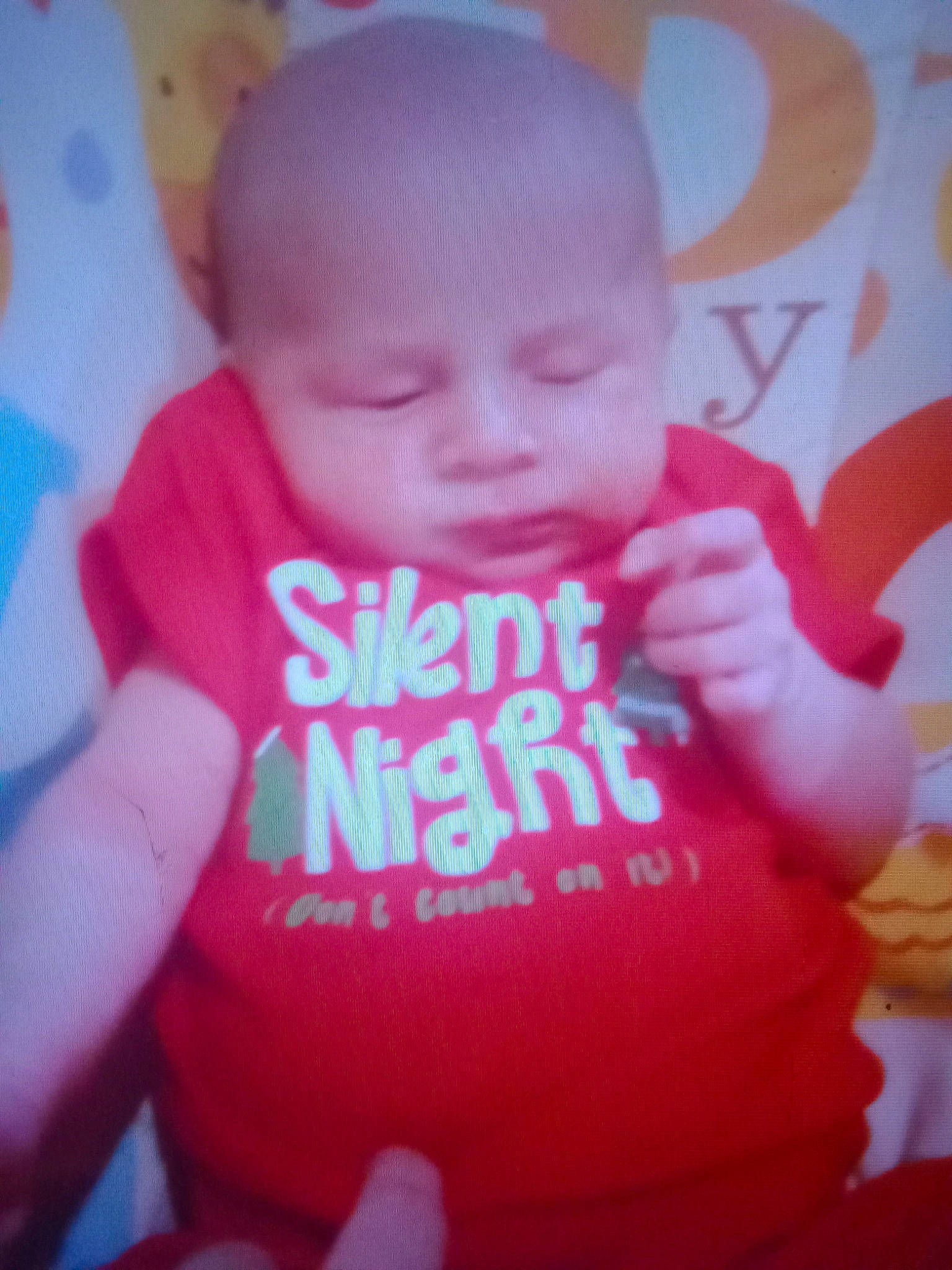 Phoenix is registered to the contest to win money with this photo: baby, baby_toddler_clothing, cheek, chest, cool, finger, gesture, hand, happy, human_body, lip, magenta, mouth, nail, neck, person, pink, skin, sleeve, thumb