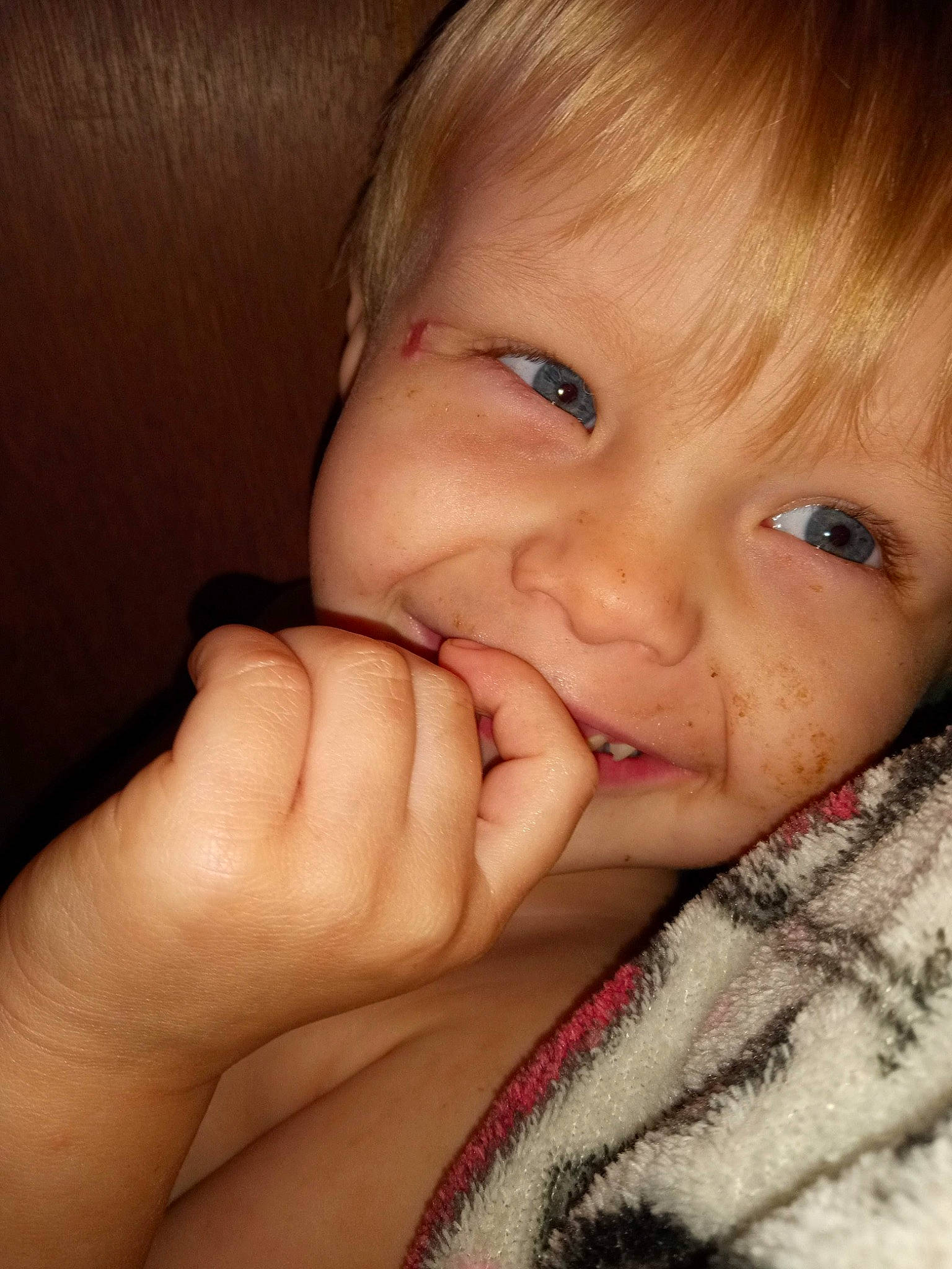 Ryder is registered to the contest to win money with this photo: cheek, ear, eyebrow, eyelash, finger, forehead, gesture, hand, happy, iris, jaw, lip, mouth, neck, nose, person, skin, smile, thumb, toddler