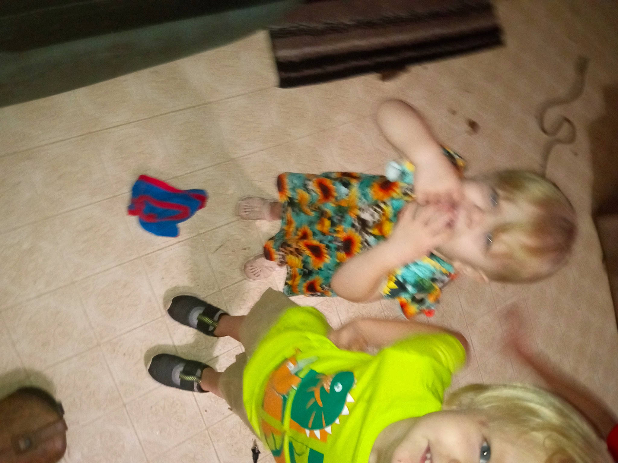 Ryder is registered to the contest to win money with this photo: baby, baby_toddler_clothing, child, floor, flooring, foot, fun, happy, hardwood, head, human_leg, leg, leisure, mouth, nail, person, room, sandal, toddler, visual_arts