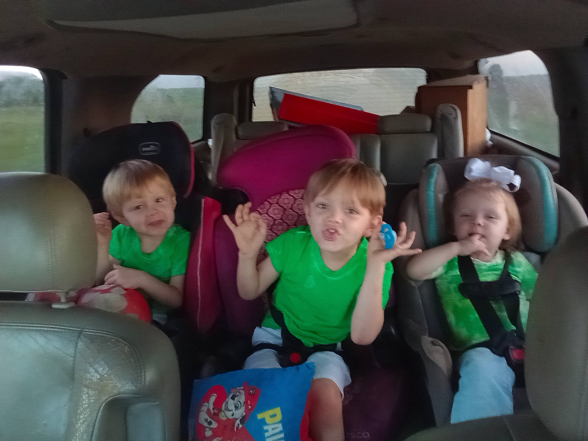 Alexander is registered to the contest to win money with this photo: auto_part, automotive_design, automotive_exterior, car, car_seat, car_seat_cover, fun, head_restraint, leisure, mode_of_transport, motor_vehicle, person, plant, seat_belt, shorts, smile, steering_wheel, t_shirt, toddler, vehicle