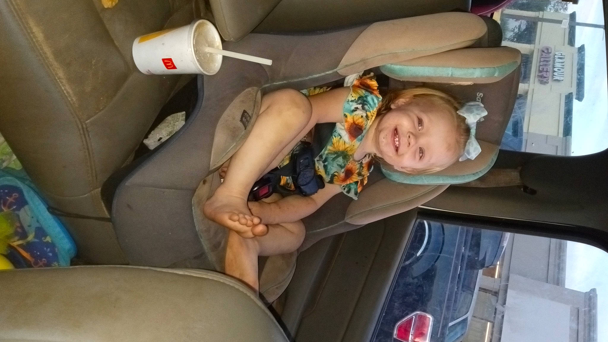 Emma is registered to the contest to win money with this photo: auto_part, automotive_design, automotive_exterior, baby, car, car_seat, car_seat_cover, child, comfort, family_car, fun, head_restraint, joy, luxury_vehicle, motor_vehicle, person, sitting, smile, toddler, vacation