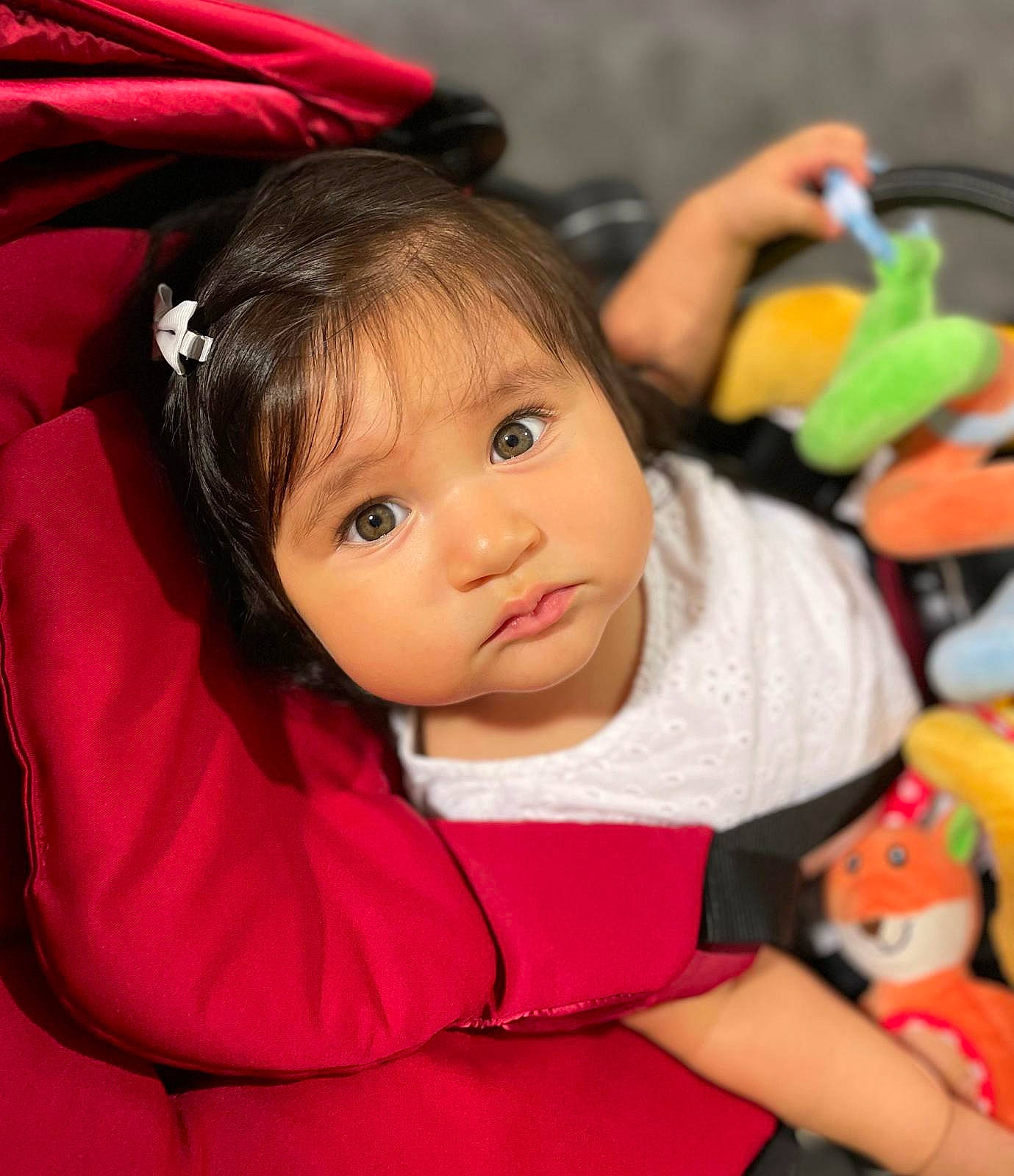 Anaïa participe au concours pour gagner de l'argent avec cette photo : baby, baby_toddler_clothing, black_hair, cheek, child, chin, eyelash, facial_expression, fun, happy, leisure, nose, people, person, pink, product, sitting, skin, sleeve, snapshot